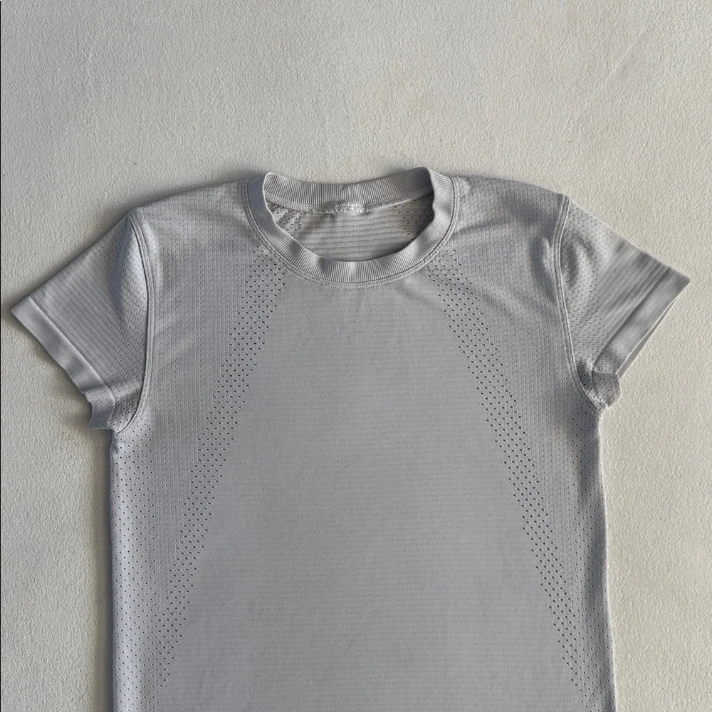 Lululemon Train to Be Short-Sleeve Shirt
White / silver gray - Picture 3 of 10